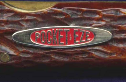 This is the more common, but still pre-WWII, PocketEze shield with the red background.