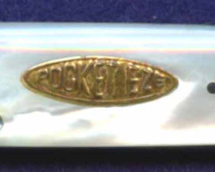 This is a gold-leaf PocketEze shield used on some premium pearl handled knives. This shield is pre-WWII, as well.