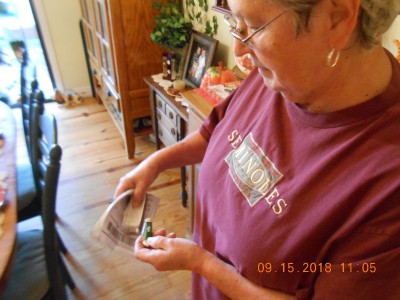 Joy admiring her new green RR Mini-Canoe