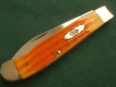 2006 Case 6107WEZ Orange Jigged Bone Wharncliffe Mini Trapper