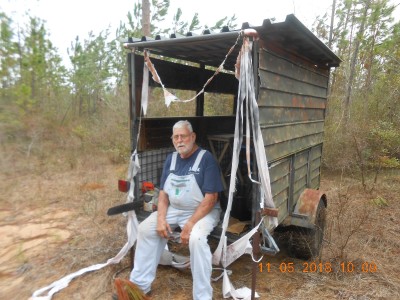 The saw gave me a workout, resting in the "shooting trailer".  The hurricane had shredded the curtain covering the open end.