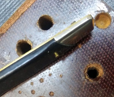 Handle pin free from liner