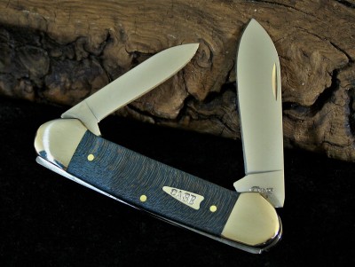 Turquoise Smooth Curly Maple Case Canoe 2019.JPG