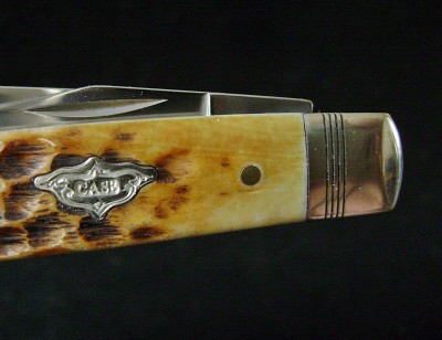 Case 2019 Mini-Trapper 6207W SS Burnt Amber - Shield & Bolster.JPG