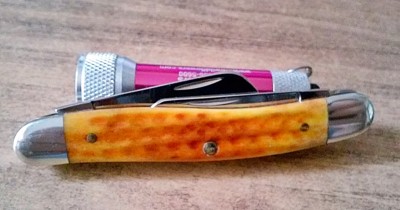 Case 2008 Stockman 6318 SS Pocket Worn Harvest Orange - Pile Closed.jpg