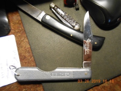 Opened to half stop, keep your fingers away as it closes with a powerful snap!  The etch is perfect.