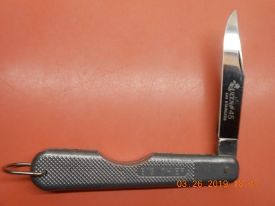 EZ Open w/half stop with way too much snap!  Perfect blade etch.