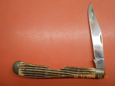 As received, the bottom half of the blade shows very few scratches, apparently spent a lot of time riding in some one's pocket with their key and pocket change.