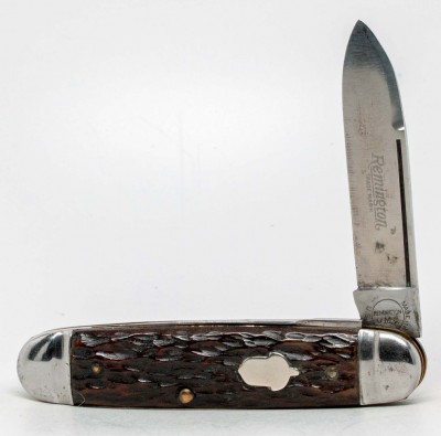 Remington R563  Closed length 3 1/4"