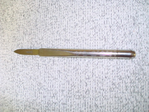 This one is a small gentleman's knife.  The marking is Sheffield Eng. to extend the blade out, the other end is turned like a lipstick.