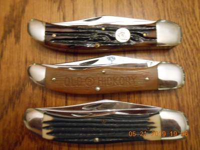 Pretty much identical except for handle material