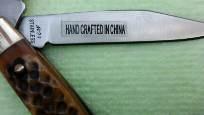 And then I found this. Kinda dissapointing even if it is made well because I wasn't expecting it to be made there. Oh well, only cost me 25 deliverd and it is a nicely made knife.