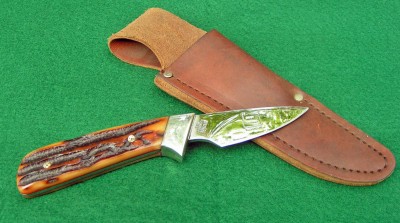 Schrade Heritage 156, I believe the handles are Amber CSB