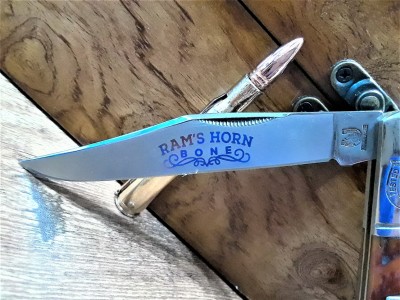 This side of the blade appears to be frosted except the logo