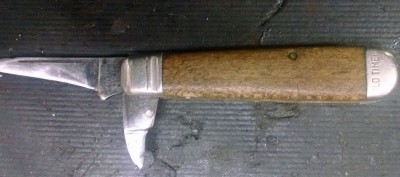This is the before picture: someone had worn the blades down and replace the bone handles with wood.