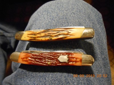 2 Camillus Muskrats different imitation stag patterns