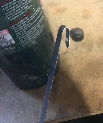 Roughly bent into shape