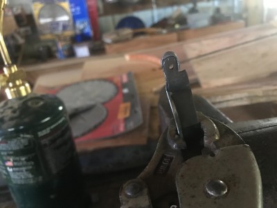Heated and shaped to fit the tang