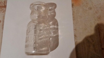 Bottle: QUEEN CITY DAIRY INC. CUMBERLAND, MD. HALF PINT SAFE MILK &amp; at the upper section it says "It Whips"
