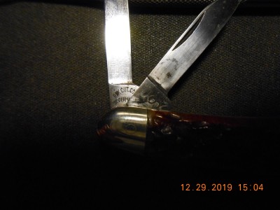 small blades showing both stamps