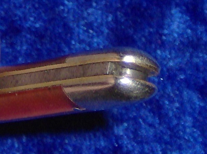 knife id 2 14/16 inch long