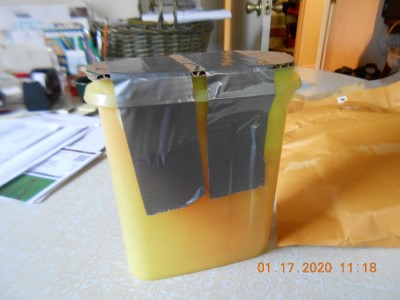 When I opened the envelope I found a Tupperware container with a card board top, duct taped in place.