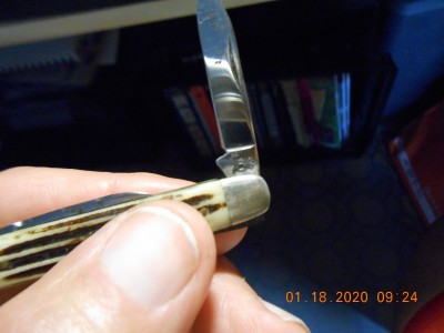 sideways "Q" stamp