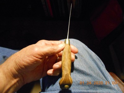 Looking down the spine it is warped to the right