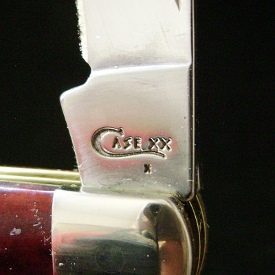 Case 2019 Mini-Trapper 6207 SS Crimson Red Bone Peach Seed Jig - Tang Stamp.JPG