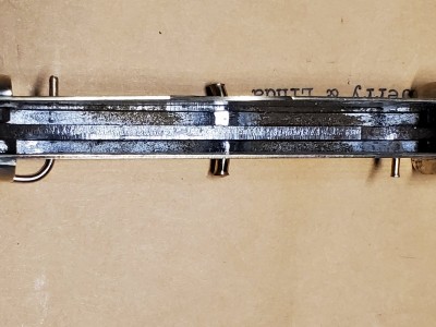 Another view of bent center pin. Also two end pins remain in liner and two came out when handles removed