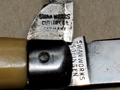 Close up of blades with stampings. Vertical blade is the broken one.