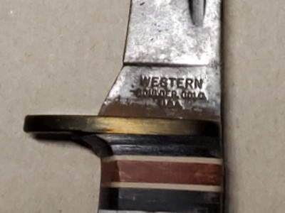 Left side tang with "Western" stamp