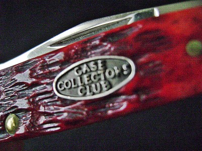 Case 2013 Mini-Trapper 6207 SS Red Bone - Case Collectors Club - Shield.JPG