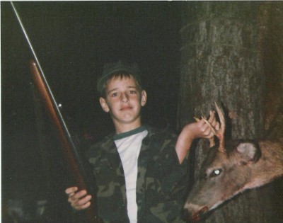 My son, iron sights Remington 788 .243  (4th grade,I think)