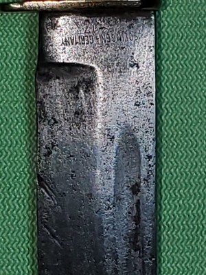 Pile side after cleaning; note gouges along blade edge