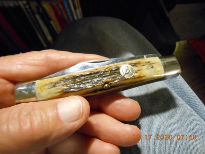 The mark side with less grain in order to affix a shield.