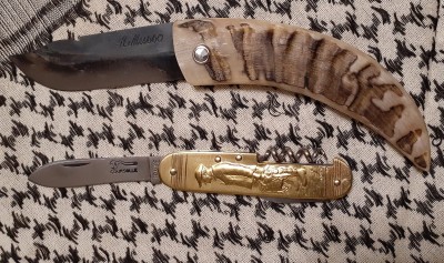 Above is a Corsican shepherd's knife (another friction folder) by Alexandre Musso, with carbon steel blade and ram's horn handle. Below is a 3 piece Coursolle with flat brass handle scales, with the figure of a Breton fisherman.