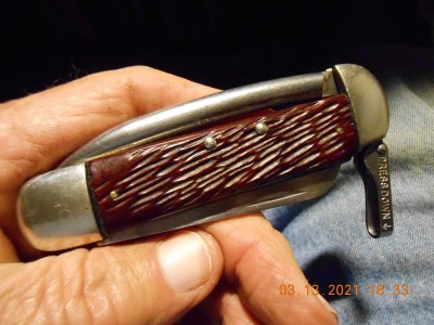 I wonder what handle material is on this one?  Seems to have shrunk more than Delrin.