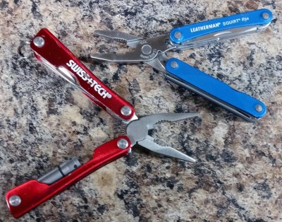 This picture has two of my favorites, the Leatherman Squirt and the Swiss Tech multi tool. I have been carrying the little Leatherman since it arrived. I carry it in the watch pocket of my jeans. The arthritis has gotten worse in my hands I find I need a little pair of pliers a lot of times hold on the things with my fingers anymore. These two were a welcome addition to my collection of small multi-tools. I like them both better than I like the M4 Seber tool That I was carrying before these two showed up. So far my favorite is the Leatherman.