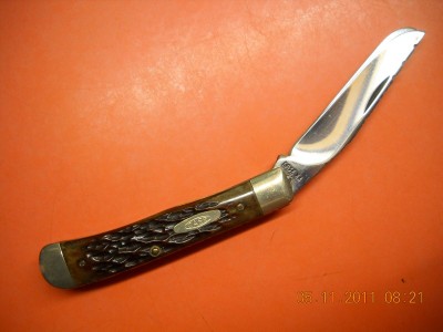 Blades in the 1/3 stop position created by file work on underside of springs.