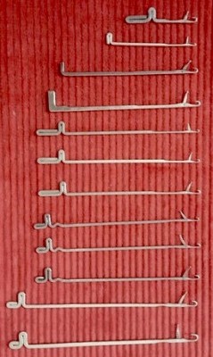 The latch needle image that is stamped <br />on the knife, matches the latch needle <br />that is the fourth image (the latch is <br />partially open) from the top.