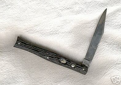 schrade_button.jpg