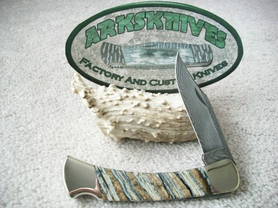Buck 110 NS Damascus Mammoth Tooth #1.jpg