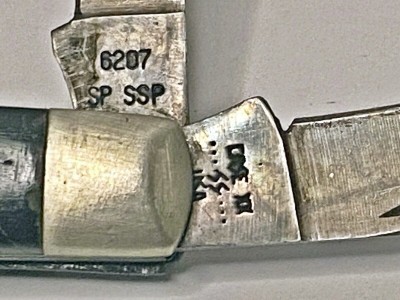 Case 1972 Mini-Trapper 6207 SP SSP - Sellers Pic Tang Stamps.jpg