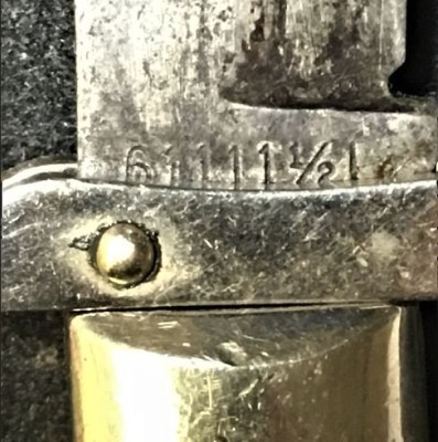 Case XX 61111 12 L close-up of 61111L on tang 6 of 7.JPG
