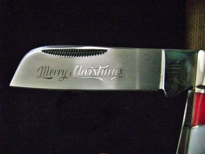 Rough Rider RR2393 Half-Hawk Christmas Red & White - Blade Etch.JPG