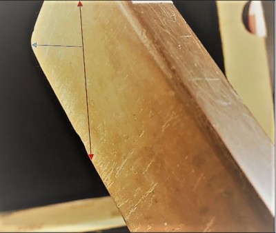 angled with cut off stickerof sham of unlnown not a Charnely Forest hone.JPG