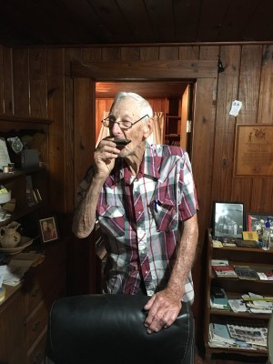 Playing his harmonica last year.