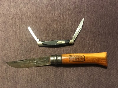 Buck 305 and Opinel number 7.