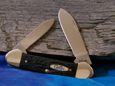 2014 Gumfuddy Rough Black Synthetic Canoe.jpg